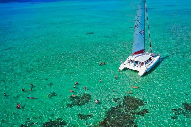 Catamaran to Ile aux Cerf with Parasailing, Tube Riding & Lunch - An early pickup from Trou d’Eau Douce