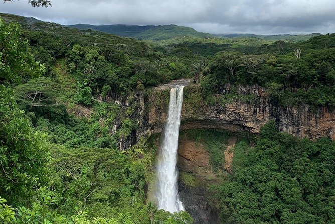 Dolphin Experience in Open Sea and South West Tour of Mauritius including Lunch - Chamarel’s colored earth and waterfall