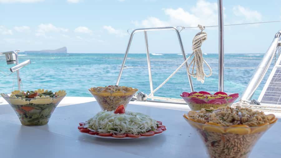Full Day Catamaran Luxury Cruise to Northern Islands w Lunch - Flat Island brings the first snorkeling stop