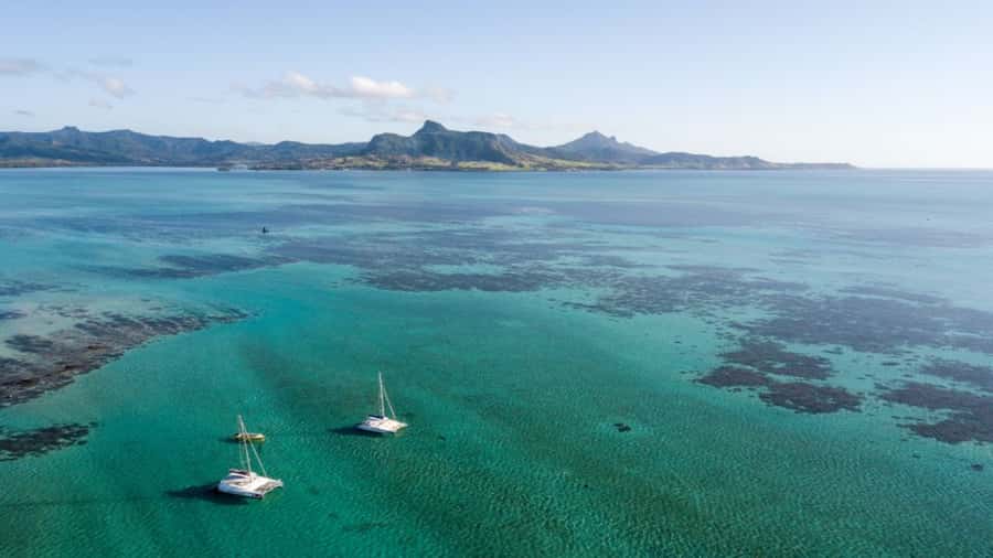 Ile Aux Cerfs Catamaran Cruise & Waterfalls- Lunch & Drinks - BBQ lunch with beer, wine, and local rum