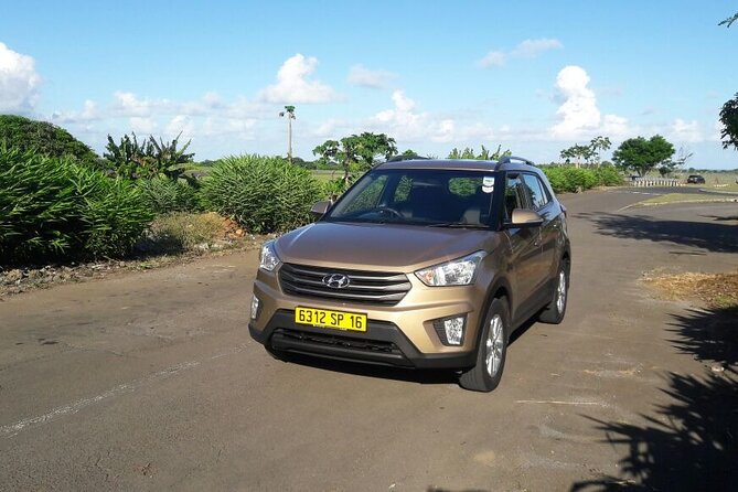 Mauritius Airport Transfer to Island Hotels by SUV Car - Landing at Mauritius Airport and finding your driver