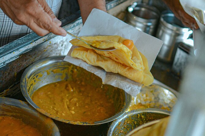 Port Louis Street Food and Cultural Walking Tour - Aapravasi Ghat and the story of indentured labor
