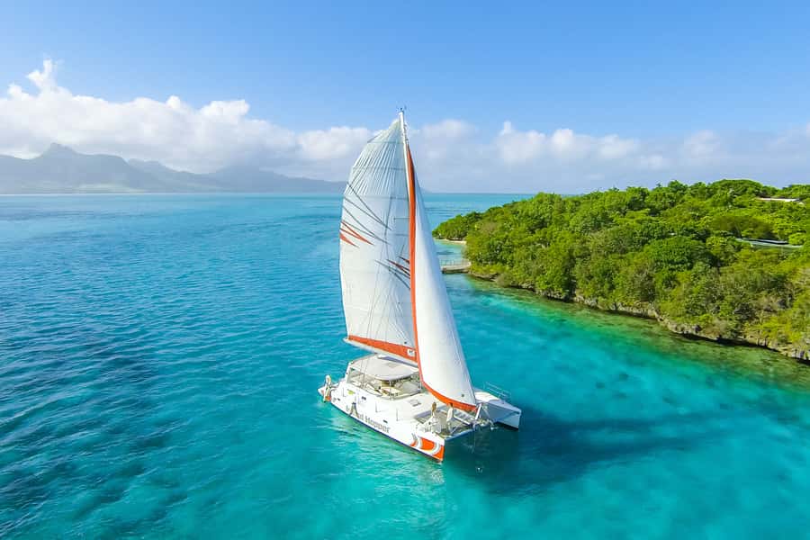 Private Catamaran Charter to Ile aux Cerfs - Snorkeling in calm turquoise water