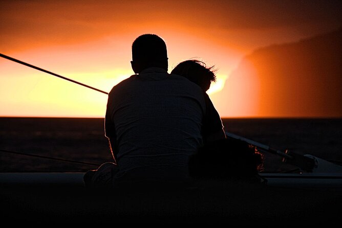 Private Exclusive Sundowner catamaran with Dinner & Transfer - Snorkeling is a bonus, not a guarantee