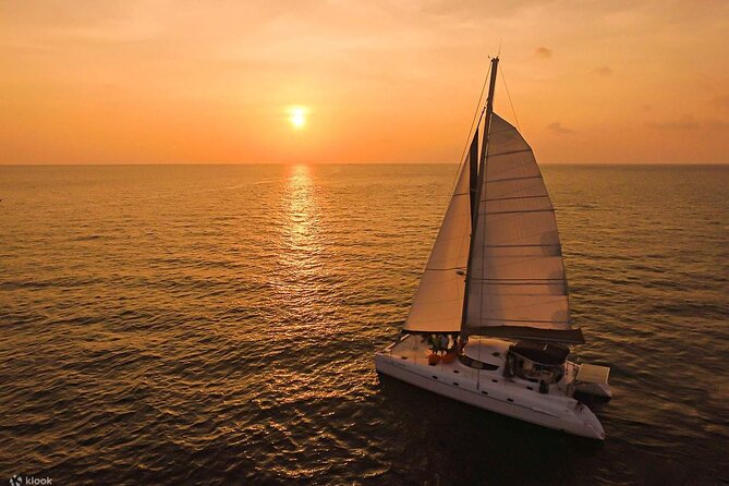 Private Exclusive Sundowner catamaran with Dinner & Transfer - The return under moonlight