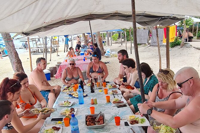 Snorkel with Dolphins, Lunch on Benitiers island, Speedboat - Crystal Rock adds a second water stop