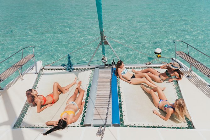 WEST Shared Cruise : OCÉANE Full Day Catamaran Ile aux Bénitiers - Snorkeling above the Black River patch reef